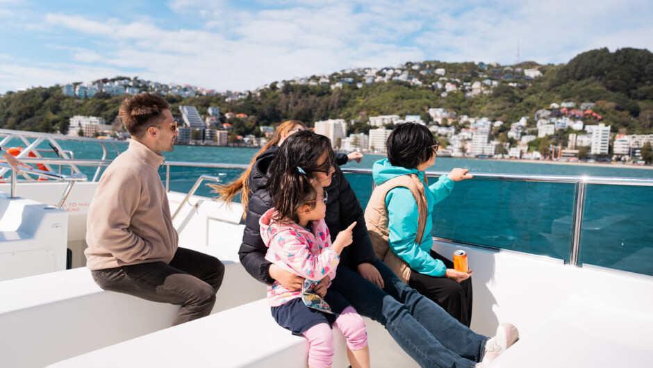 People on top deck enjoying the harbour view
