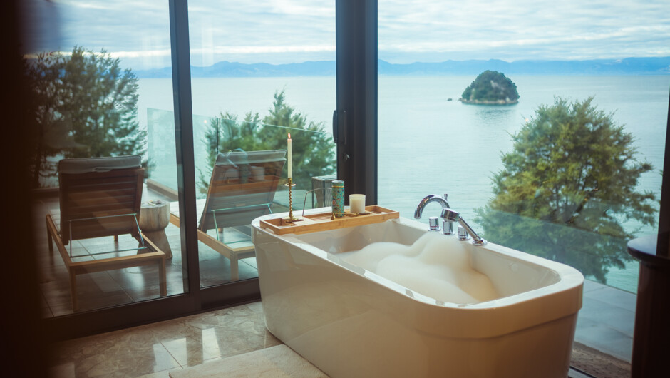 A deep soaking bath framed by breathtaking ocean views