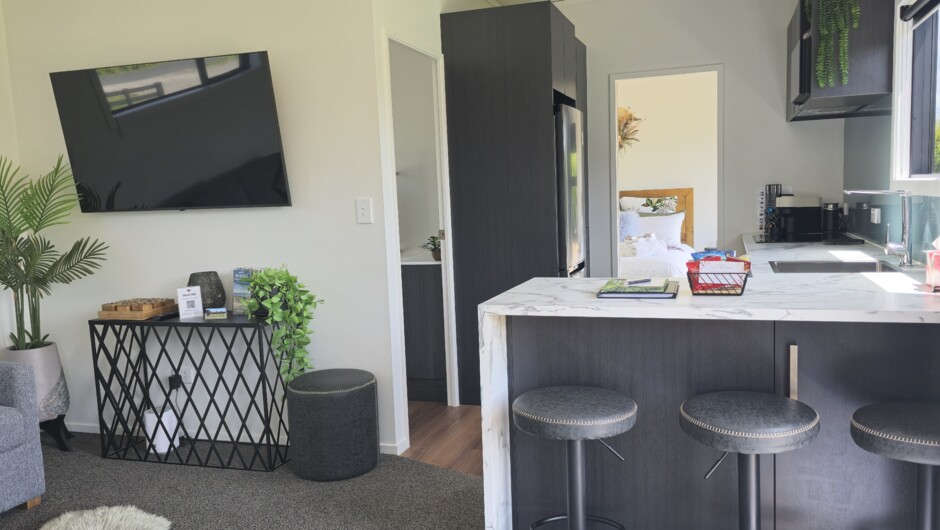 Peaceful’s living room and kitchen area.
