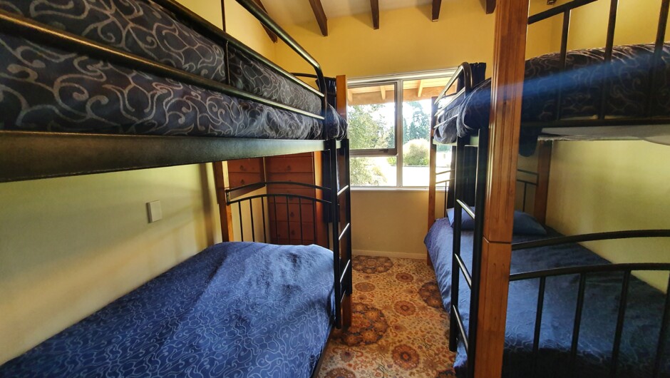 Bunk room sleeping four. Wool filled duvets supplied.