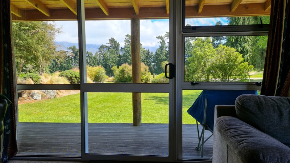 The lounge opens straight out onto the large lawn with views to Mount Hutt.