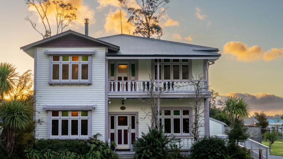Holly Homestead frontage, free parking near front door, outdoor seating in garden and rear balcony.