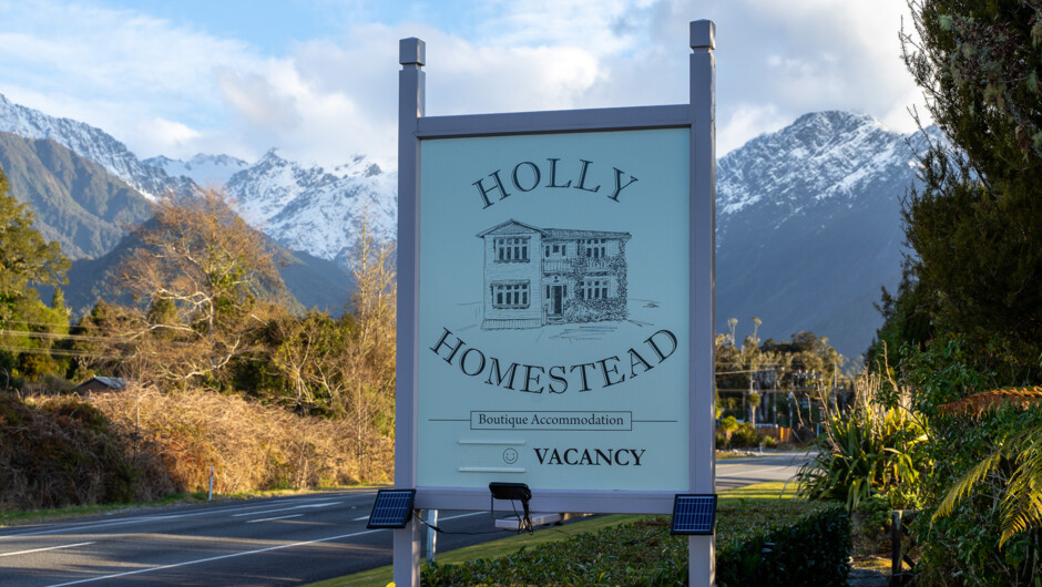 Holly Homestead street sign looking south, 1.5km north of Franz Josef village