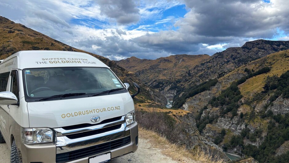 The tour van parked on Bells Hill