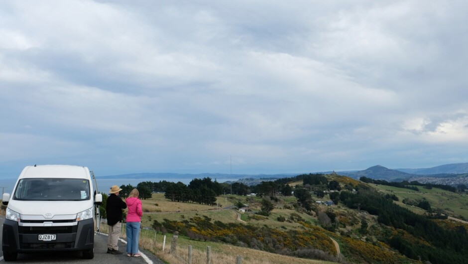 Stop for photos of the renowned Peninsula coast line - the moody sky constantly delivering.