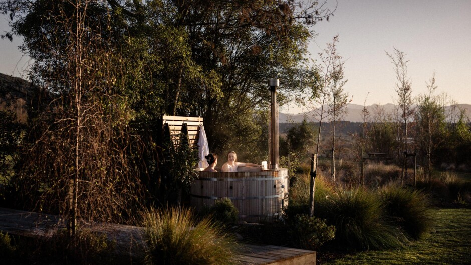 Soak in the wood-fired hot tub and listen to the rippling of the Rangitata and the chirping of the pīwakawaka overhead.