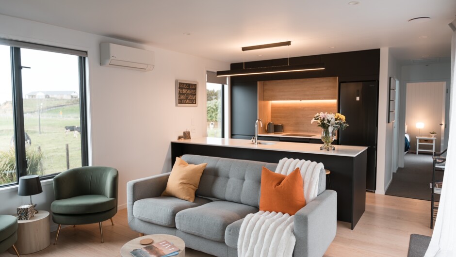 The Kitchen. Built for real cooking, not just reheating. Pack the ingredients and let your imagination do the rest - you'll find everything you need to put together a proper meal, with bar stools at the island or the big table out on the deck for al fresc