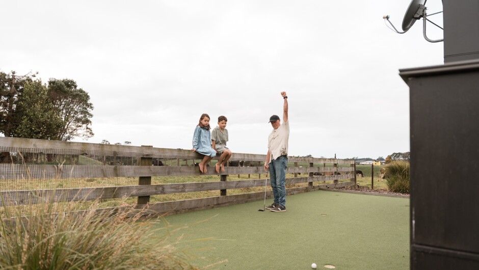 The 5-Hole Putting Green. Right outside your door - putters and balls provided. Play a casual round solo, challenge the kids, or settle the family bragging rights after dinner.