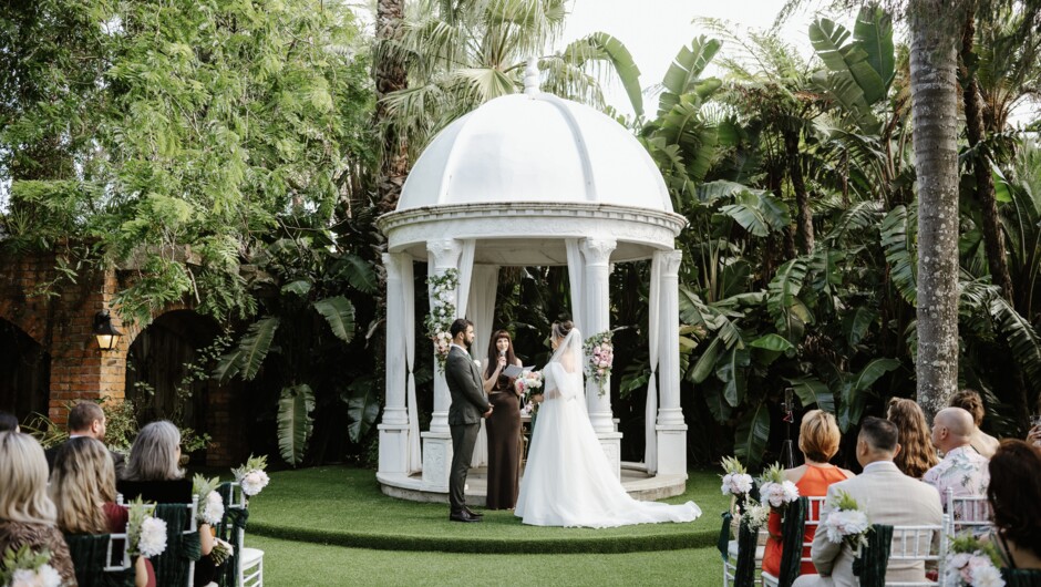 Garden wedding ceremony at Settlers Country Manor Auckland