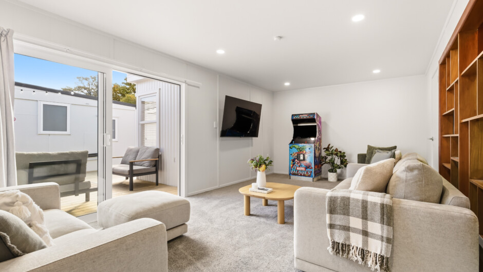 Second Living Space featuring Arcade Machine, and private outdoor patio