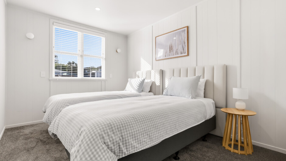 Bedroom featuring twin single beds