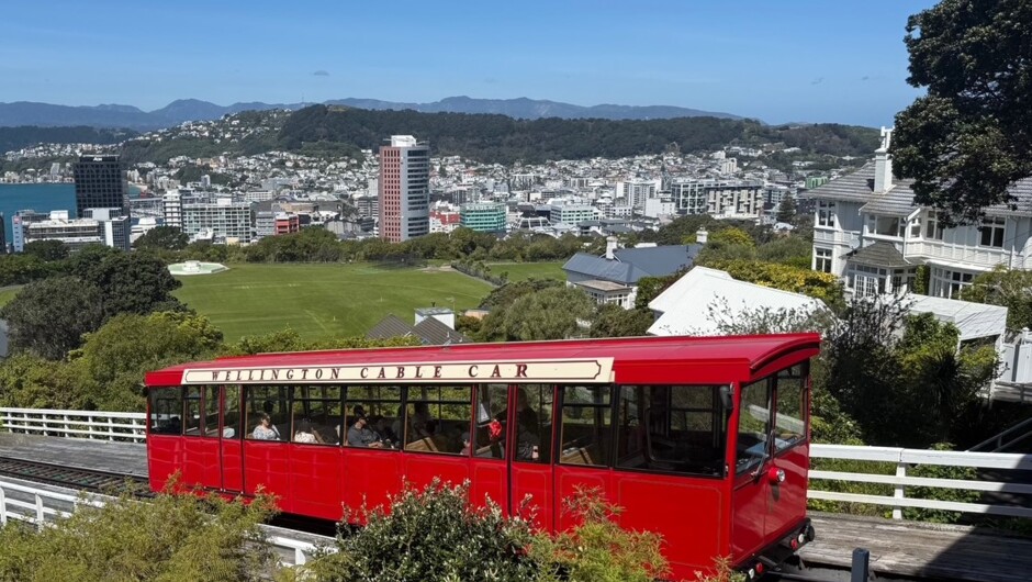 Cable Car arriving at top terminal. View across city to Matairangi Mt Victoria