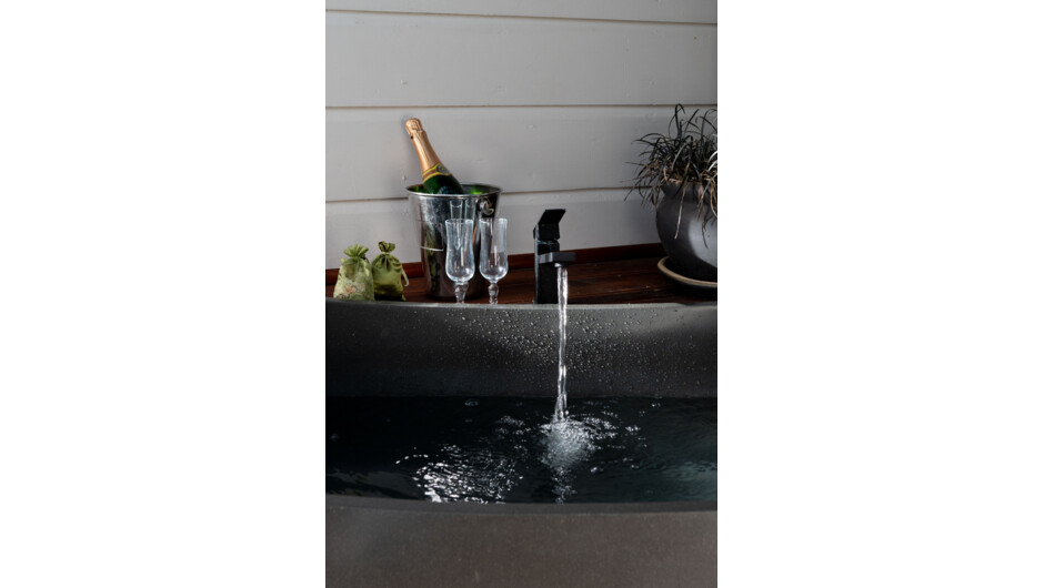 Relax and unwind in the oversized quartz stone bath
