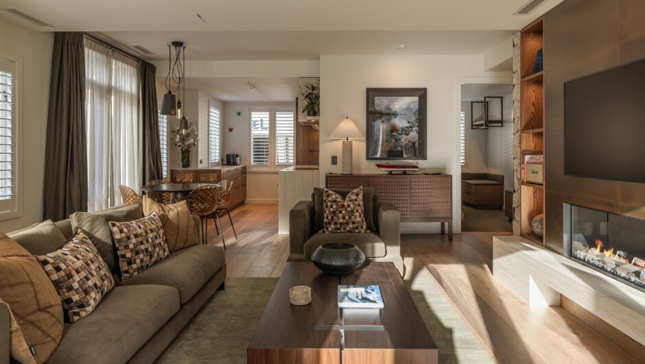Open-plan living room and kitchen at 11 Earl Street Queenstown
