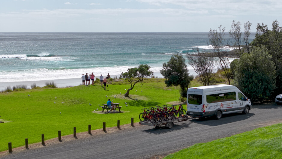 Northern Spirit riders lunch stop, with the van at Tapotupotu Bay, just south of Cape Reinga in the Far North.