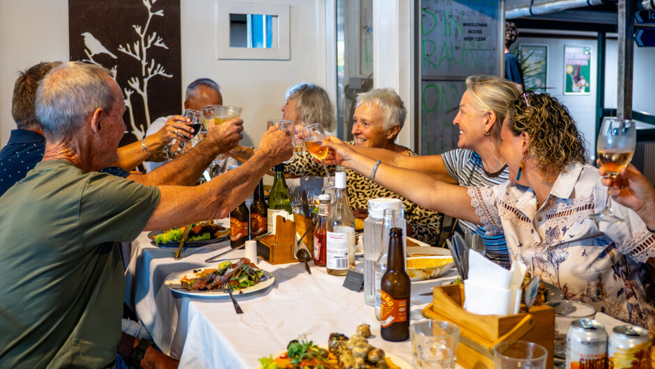 Celebrating a memorable day of riding over dinner with fellow Northern Spirit guests.