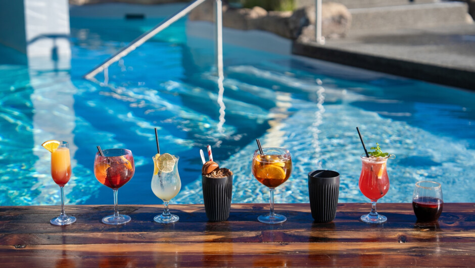 Enjoy a cocktail poolside