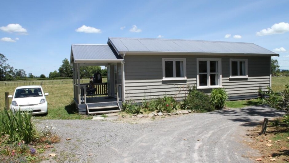 Large deck with mountain views next to Hot pool