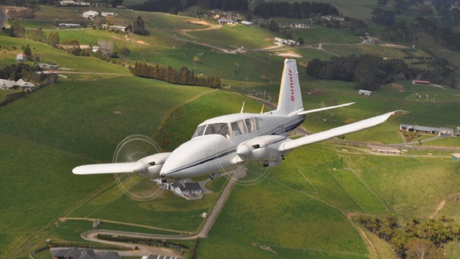 Sunair flies over the lush Bay of Plenty countryside