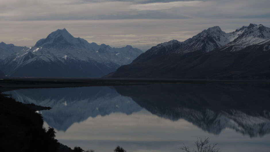 Winter reflections with Aoraki Mount Cook beyond Lake Pukaki.