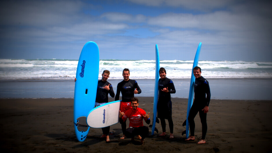 Learning to surf at Piha beach