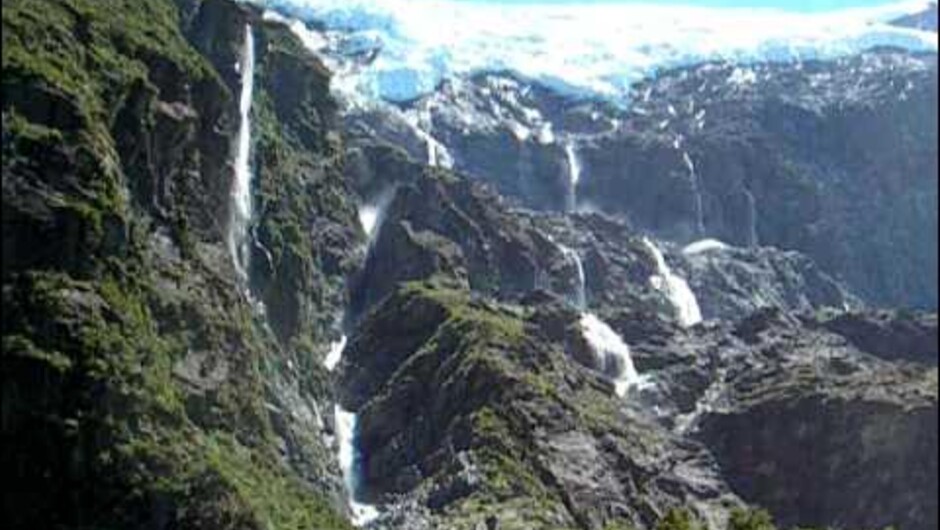 Rob Roy Glacier and a 261m waterfall  in Mt Aspiring National Park, near Lake Wānaka, New Zealand