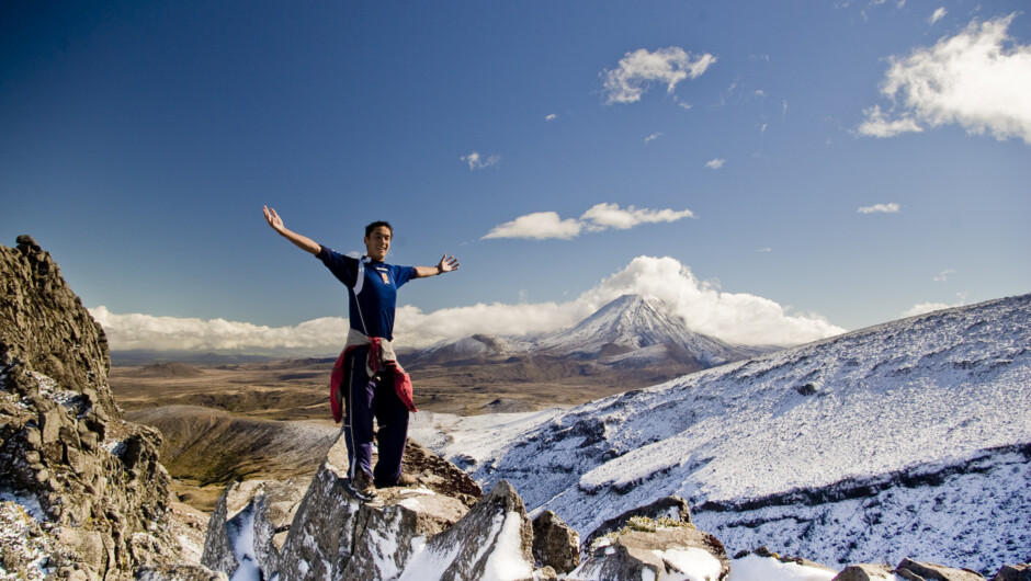 Walk the best day-hike in the world, the Tongariro Alpine Crossing, from November to April, carrying only a day pack.