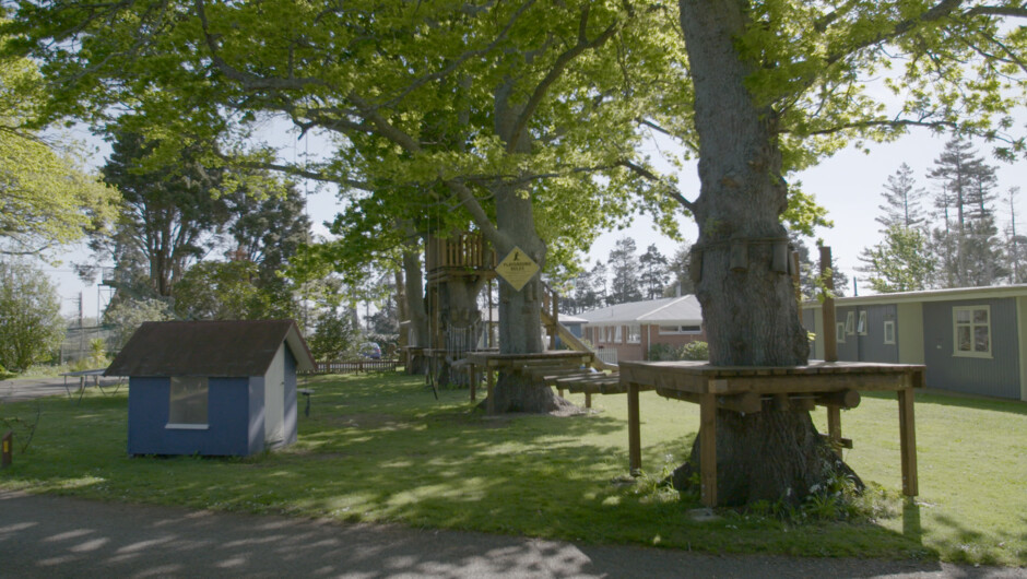 Play house showing swing bridges and apartments