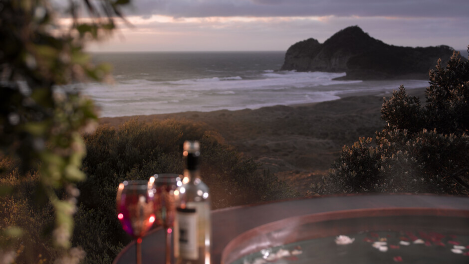 Private portable hot tub filled with fresh rain waters and scented flowers.