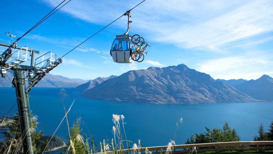 A Gondola cabin carries a group of riders and the bikes to the top of the Skyline Bike Park.