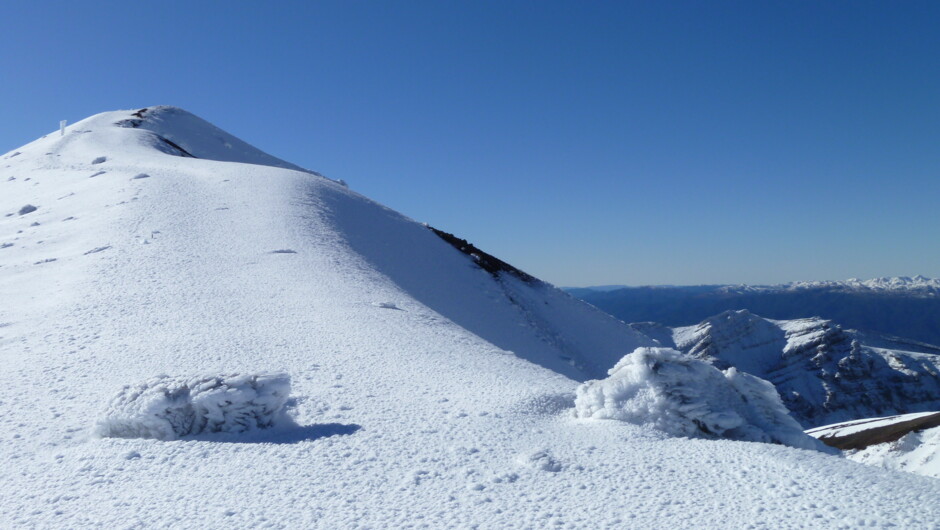 The highest point, top of Red Crater - small groups, first tracks