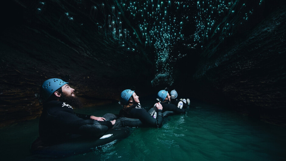 Floating down underground rivers on the Black Labyrinth tour.