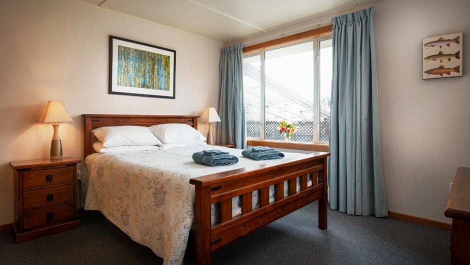 The first bedroom has a queen bed.