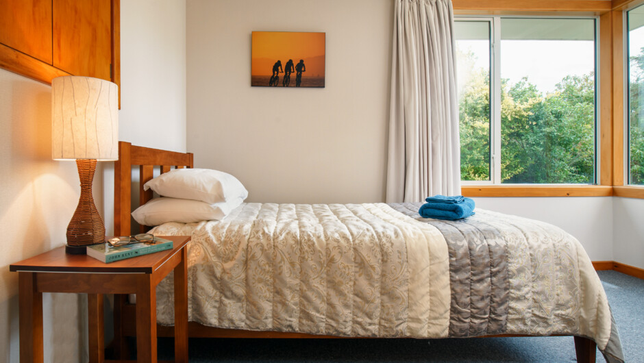 The third bedroom has a king single bed.