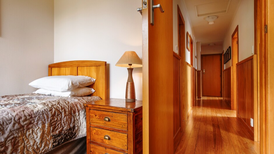 The fourth bedroom has a long single bed.