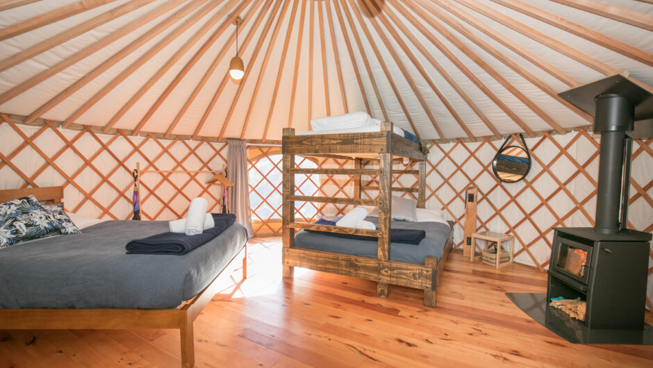 Family/ Group Yurt interior, with 3 separate New Zealand made beds.