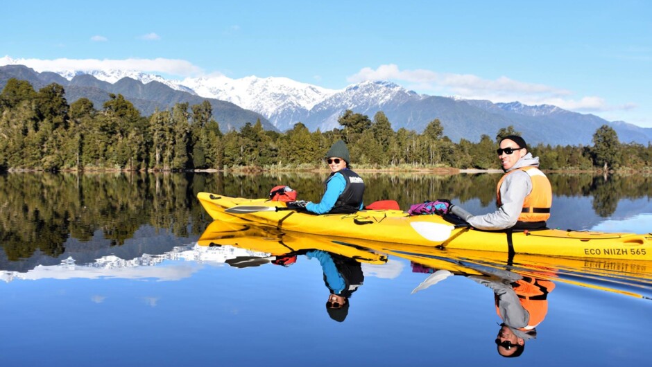 Paddle with us on a mirror lake, with glacier views.