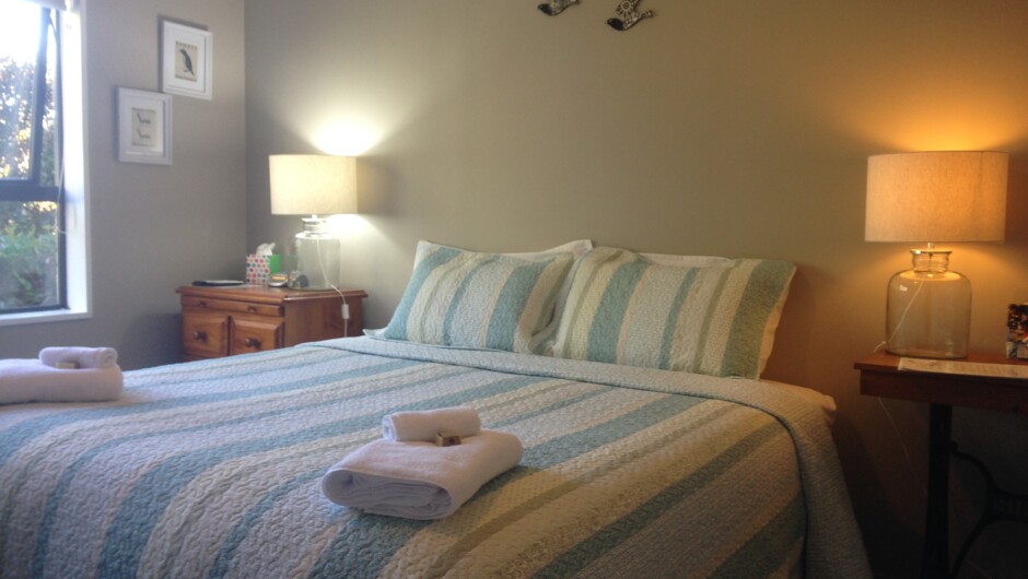Ardgowan Room set up with a king bed at Gumtree Farmstay.