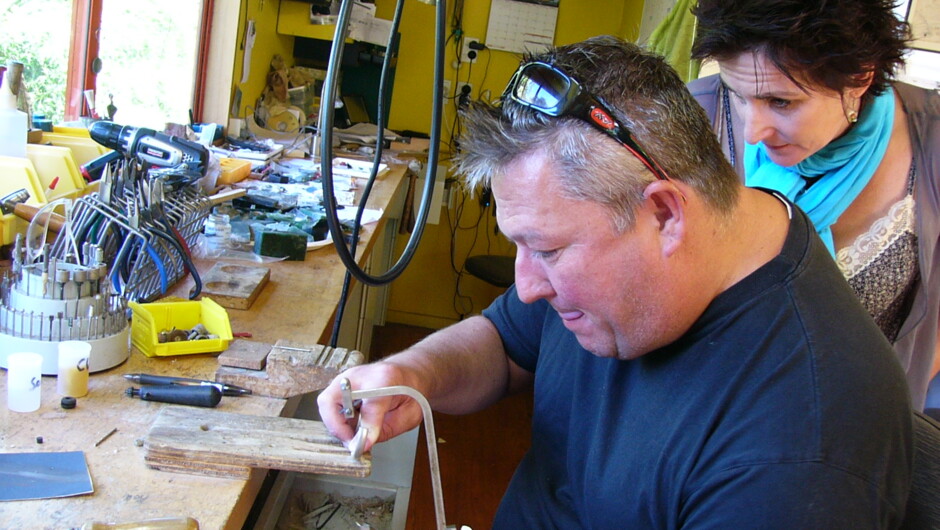 Carefully overseeing her ring