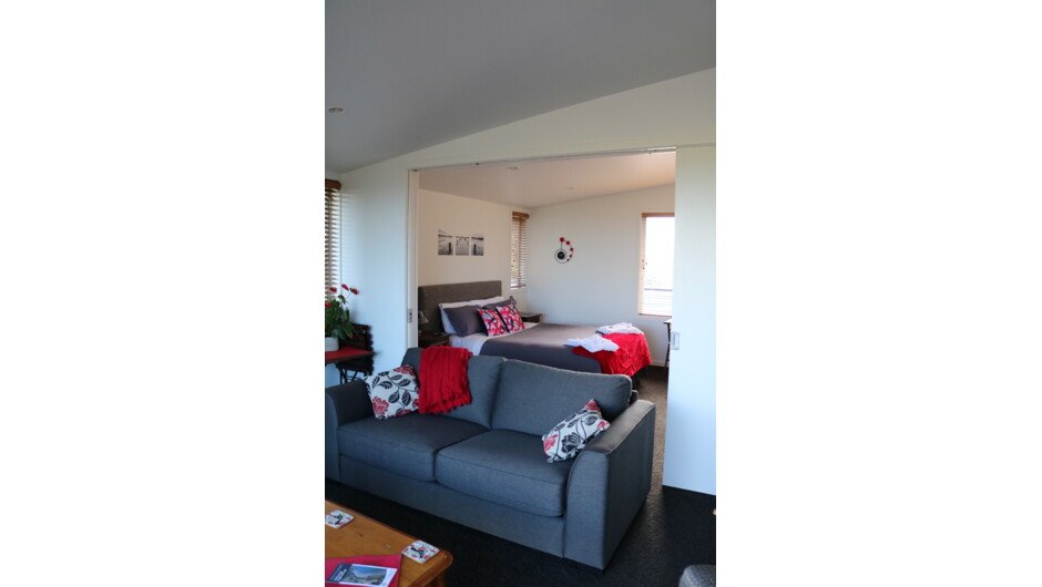 Your room and lounge. The couch can fold out as a double bed.