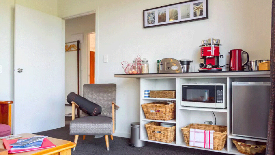 Kitchenette in your room: espresso machine, toaster, jug, microwave, toasted sandwich maker &amp; small fridge.