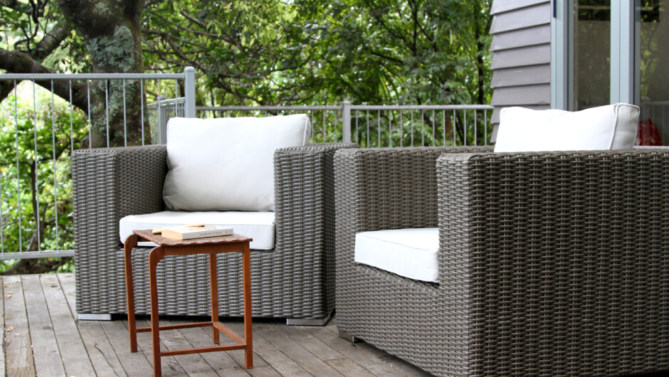 Comfortable lounging on the deck with a glass of wine and a good book.