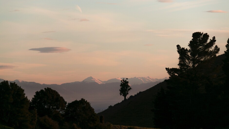 Views of the snow capped mountains from the bathroom window of the Atatū PurePod.