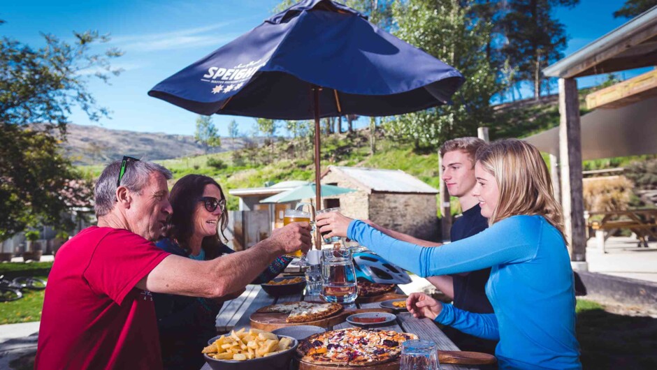 Cheers, beer and pizza at the Gibbston Tavern.