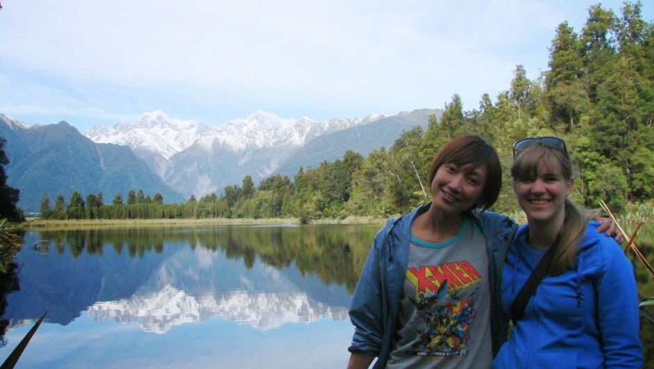 Hike around Lake Matheson with Mt Cook in the distance