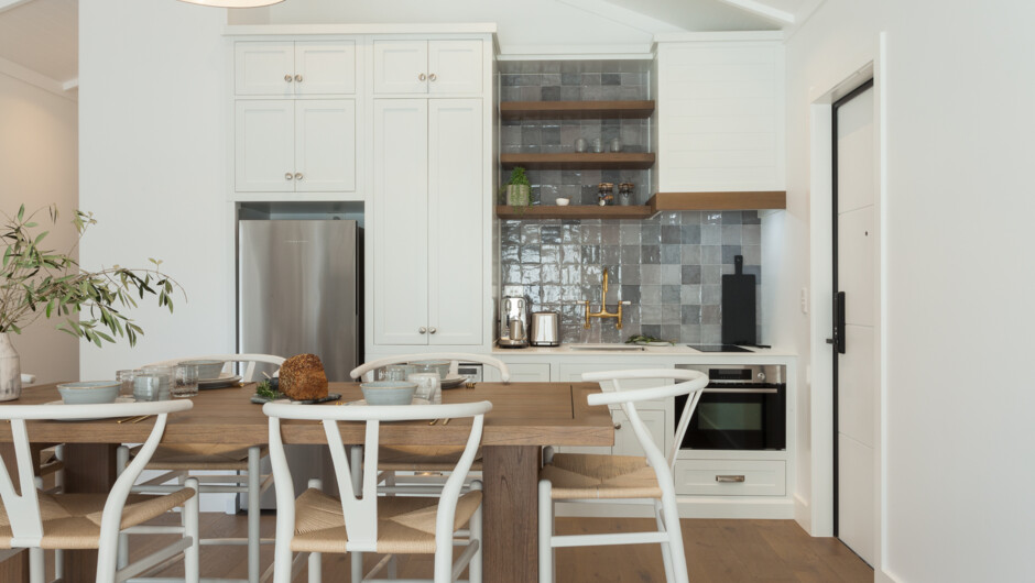 Barn One fully equipped kitchen includes espresso coffee machine.