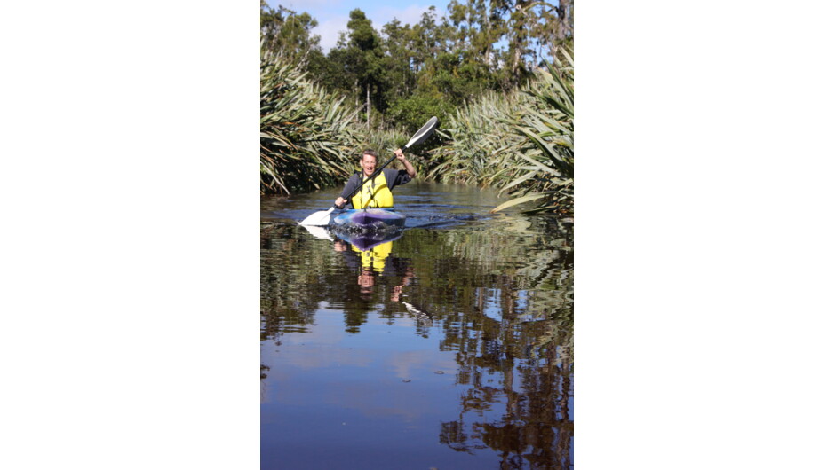 Kayaking the wetland at Paramata Lodge on the West Coast, South Island.