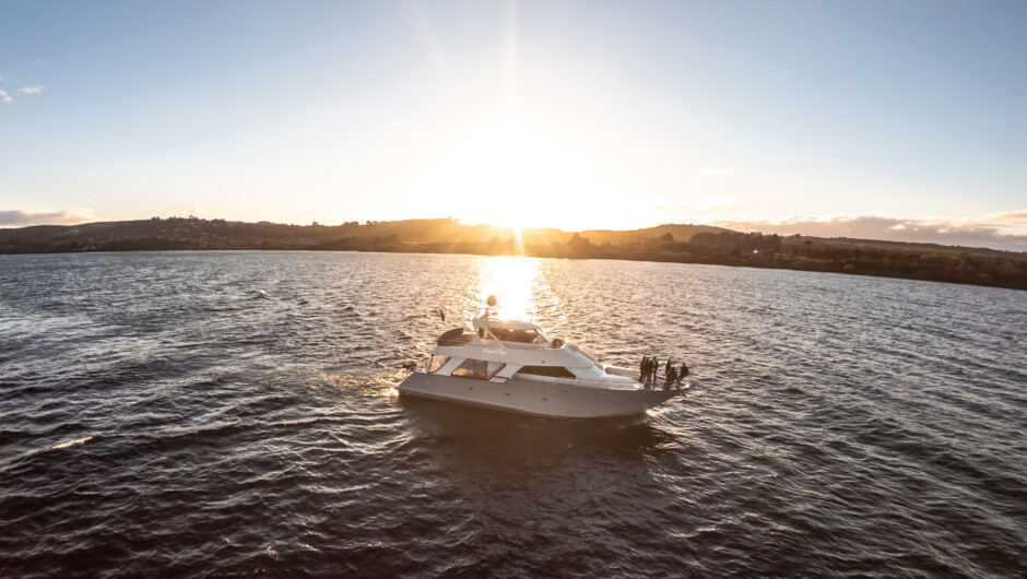The luxurious Regal Flyer cruising on sunset. Enjoy a private charter with up to 75 guests.